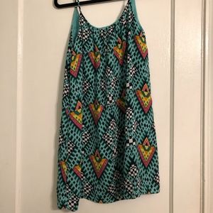 Bright sleeveless dress with low back